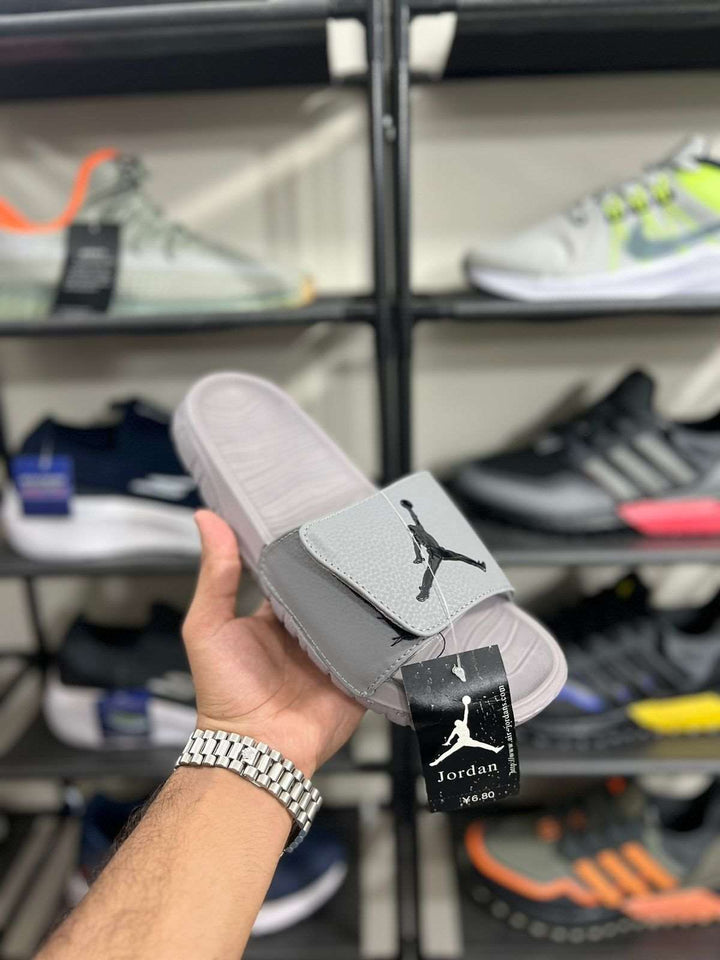 AJ slides Grey